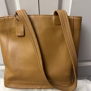 Camel colored COACH hand bag
